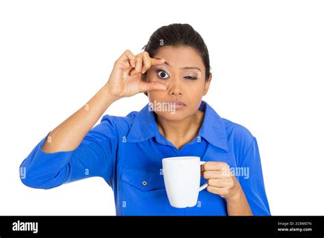 Portrait Of A Very Tired Sleepy Young Woman Holding Cup Of Coffee