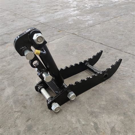 typhon attachments hydraulic thumb clip attachment  typhon mini