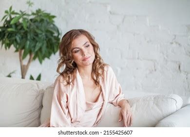 Curly Haired Blonde Woman Relaxing On Stock Photo 2155425607 Shutterstock