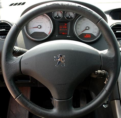 Как отрегулировать руль пежо 308