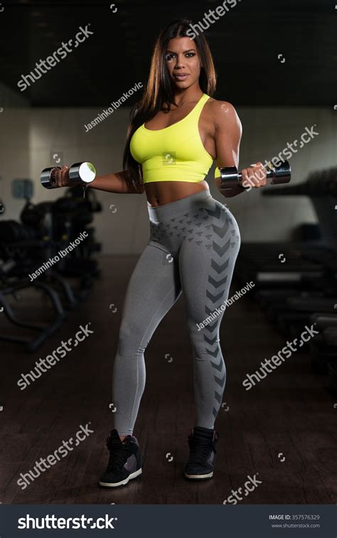Sexy Latina Woman Working Out Biceps Stock Photo Edit Now