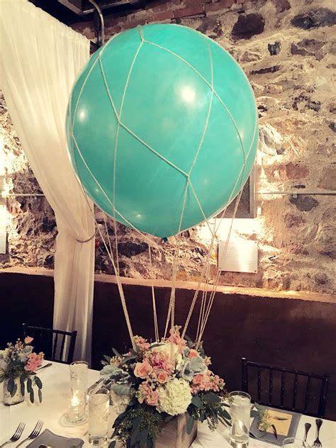 These Turned Out Amazing Hot Air Balloon Centerpiece Travel Inspired Baby Shower Baby Shower