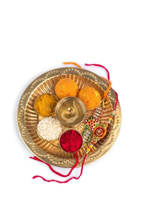 Indian Festival Raksha Bandhan With Rakhi And Rice Grains Kumkum