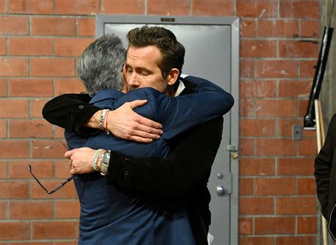 Eugene Levy and Ryan Reynolds shut down feud rumors with hug and more ...