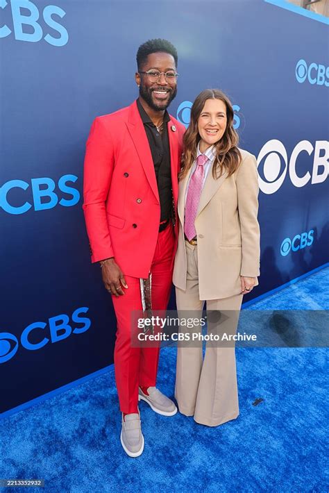 Nate Burleson and Drew Barrymore of Hollywood Squares attend the