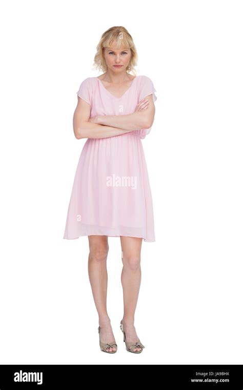 Serious Blonde Model Posing And Looking At Camera Against White Background Stock Photo Alamy