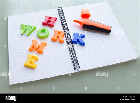 Colourful Letters On Notebook Spelling Homework Stock Photo Alamy