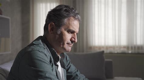 Home Alone And Sad Man Looking Around Thoughtfully Mature Man Suffering From Frustrated
