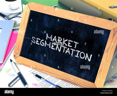 Market Segmentation Handwritten By White Chalk On A Blackboard Stock