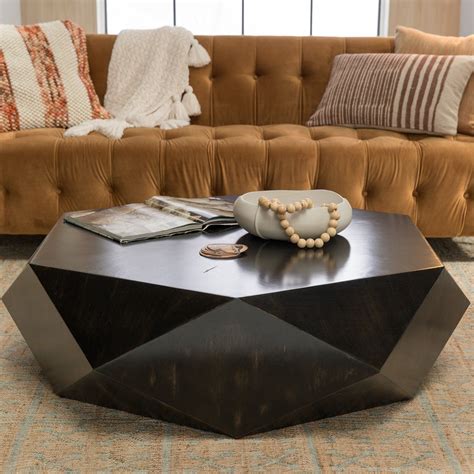 The Uttermost Volker Coffee Table with its modern geometry brings a
