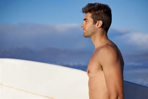 male model beach side pose pictures