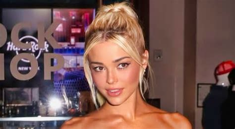 PHOTOS Olivia Dunne Had Her Cheeks Out In Tiny Blue Bikini While