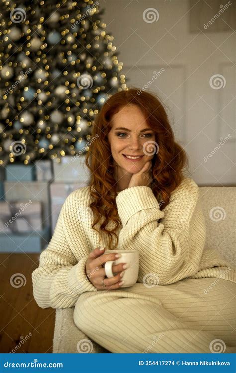 A Woman Sitting On A Bed Stock Photo Image Of Bedclothes 354417274