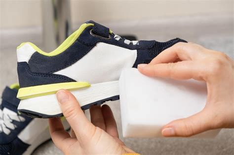 Premium Photo | Cleaning of children's shoes sneakers soles from dust ...