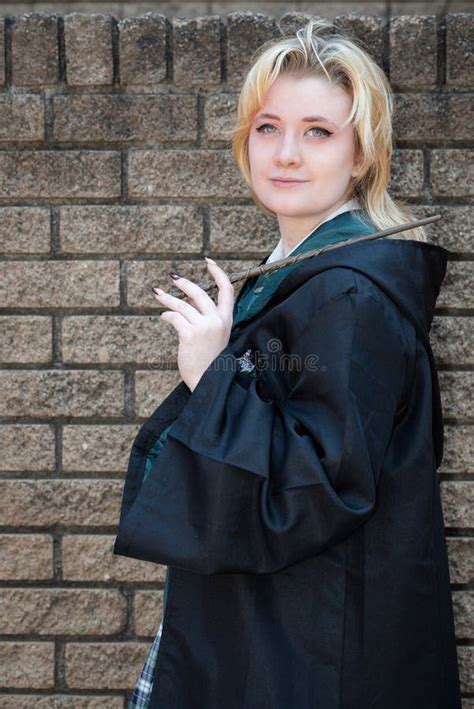 Caucasian Blonde Female Cosplayer Dressed As A Wizard With A Magic Wand Stock Image Image Of