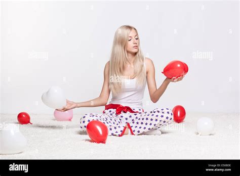 Blonde Woman With Balloons Stock Photo Alamy