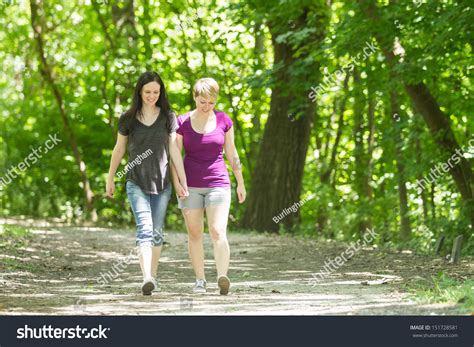 Lesbian Couple Holding Hands Walking Park Stock Photo Shutterstock