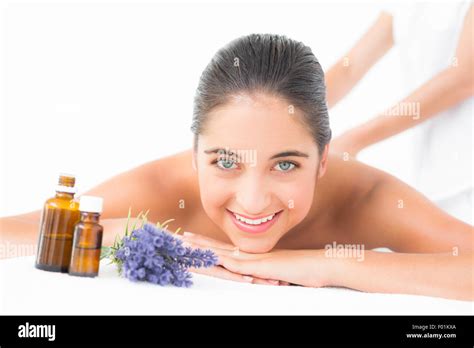 Pretty Brunette Enjoying A Massage Stock Photo Alamy