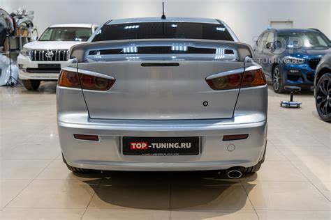 Тюнинг Митсубиши Лансер Х – спойлер, ресницы, пороги, юбка и диффузор в ...