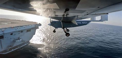 fixed wing uav lands   royal navy aircraft carrier navy