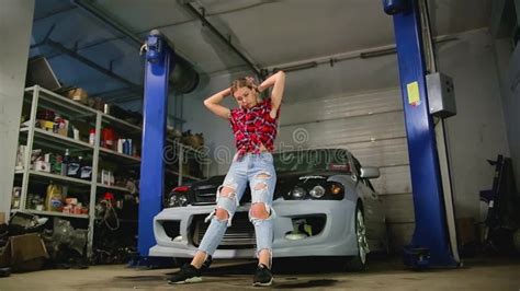 Blonde In A Garage Repairs A Car Stock Footage Video Of Pretty Gender