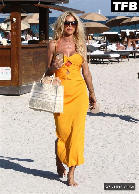Victoria Silvstedt Lounges Beachside In Miami In An Orange Two Piece Bikini AZNude