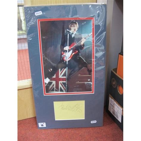 Paul Weller Signature Unverified Mounted Alongside A Phot Barnebys