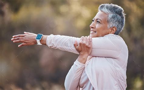 Fitness Happy Or Old Woman Stretching In Nature To Start Training