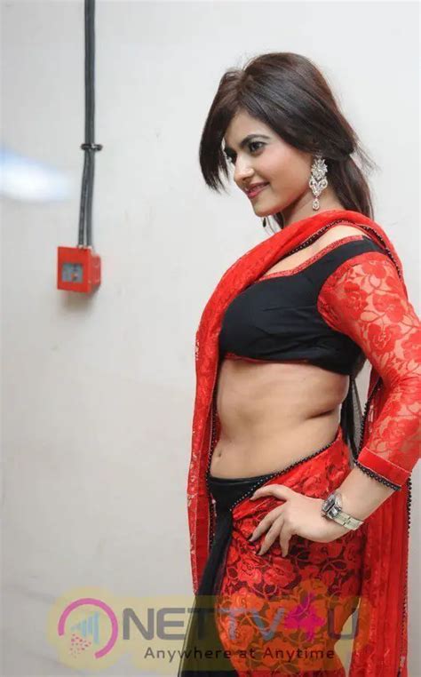Telugu Actress Lezlie Latest Hot Photos In Red Saree Galleries HD Images