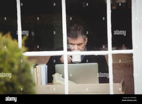 Mature Drinking Tea Hi Res Stock Photography And Images Alamy