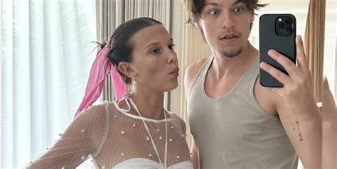 Millie Bobby Brown Gives Major Bride Vibes In A White Bikini With A Sheer Pearl Cover Up