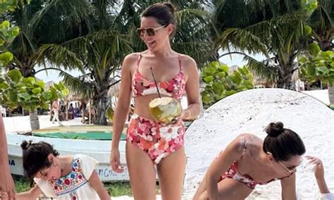 Danielle Bux Shows Off Her Tanned Abs In Chic Floral Bikini Daily Mail Online