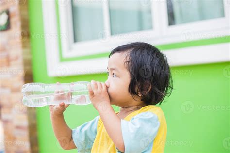 Thirsty Girl Drinking Water Outdoors 7454210 Stock Photo At Vecteezy