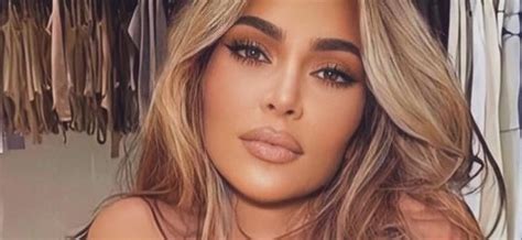 Kim Kardashian In Buns Out Bikini Looks Back At It By The Ocean