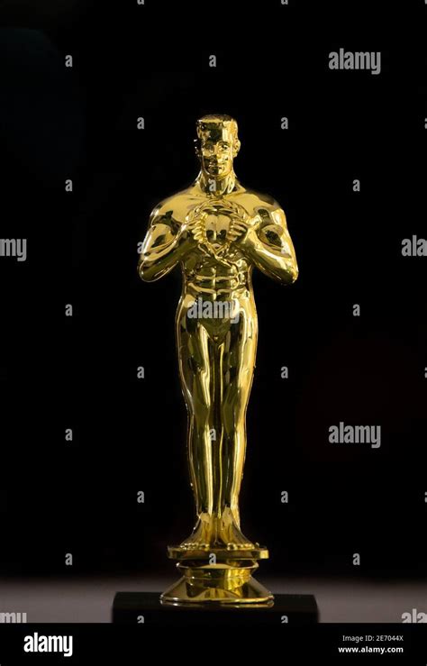 A golden Oscar replica trophy Stock Photo - Alamy