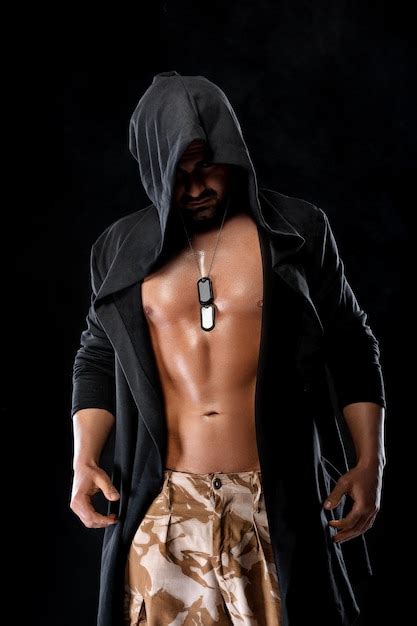 Premium Photo Athletic Handsome Muscular Man Strong Bodybuilder With Naked Torso On Black