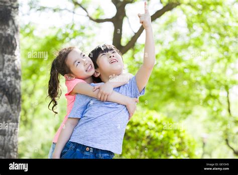 happy chinese children playing  woods stock photo alamy