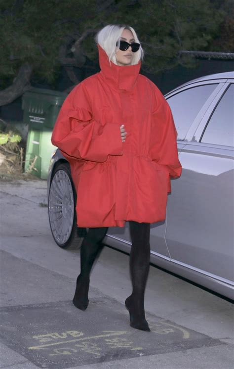 Kim Kardashian Debuts Chic Blonde Makeover And Oversized Red Coat In