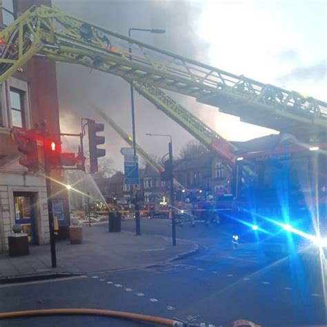 London Forest Gate police station on fire as smoke seen rising from roof