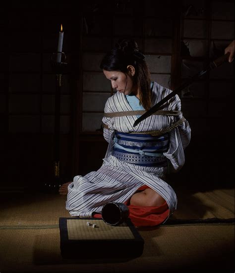 Oriental Babe In A Traditional Outfit Gets Tied Up Photos