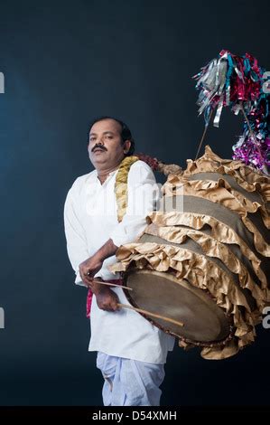 Bengali Man Playing Dhol A Large Drum Used To Play During Festival And