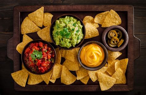 Premium Photo Mexican Nachos Tortilla Chips With Guacamole Salsa And