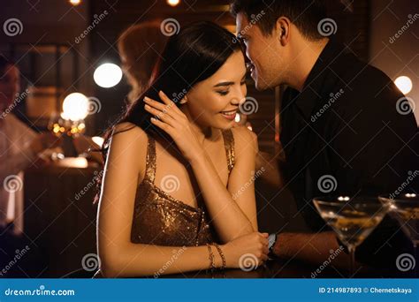 Man And Woman Flirting With Each Other In Bar Stock Image Image Of