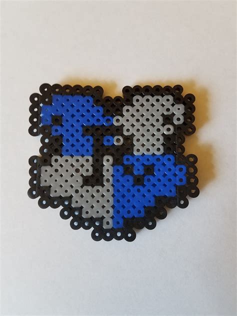 A Handcrafted Perler Creation Of The Ravenclaw House Shield From Harry