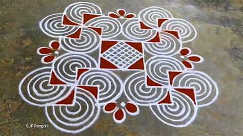 An Intricate Design On The Ground With Red And White Colors