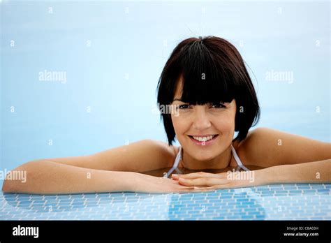 Brunette In A Swimming Pool Stock Photo Alamy