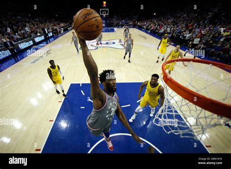 Philadelphia 76ers' Joel Embiid goes up for a dunk during the first ...