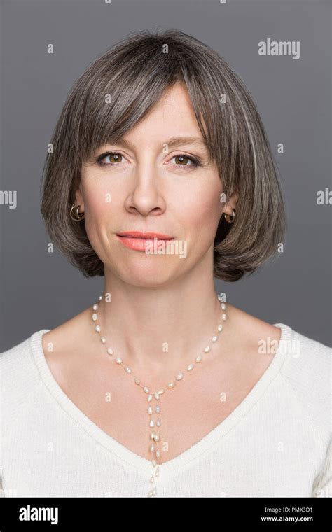 Portrait Confident Mature Woman Stock Photo Alamy