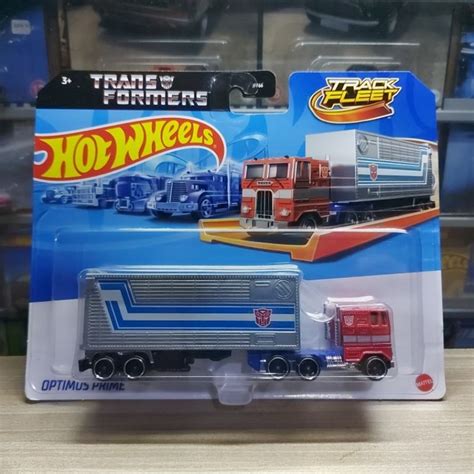 HOT WHEELS TRANSFORMERS 風火輪變形金剛擎天柱履帶車隊 蝦皮購物