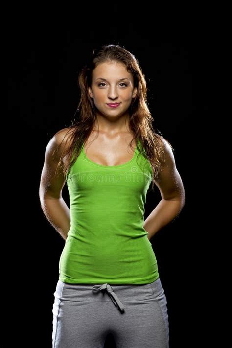 Ejercicios De Gimnasia De Yoga De Brunette En Un Ambiente De Estudio Foto De Archivo Imagen De